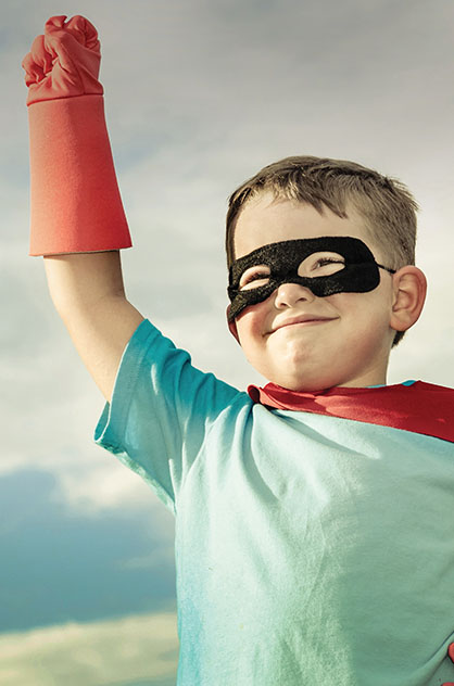 child with cap and mask